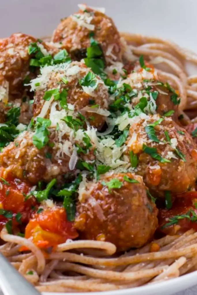 Spaghetti with Meatballs with parsley and Parmigiano 